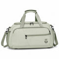 Light green travel gym bag with shoe compartment